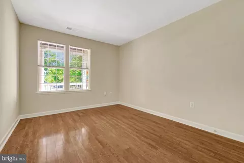 Living - 22710 Blue Elder Ter #203, Brambleton, VA 20148 photo 5 of 5