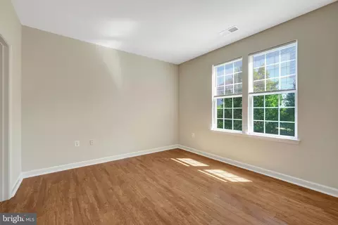 Living - 22710 Blue Elder Ter #203, Brambleton, VA 20148 photo 3 of 5