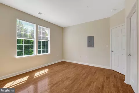 Living - 22710 Blue Elder Ter #203, Brambleton, VA 20148 photo 4 of 5