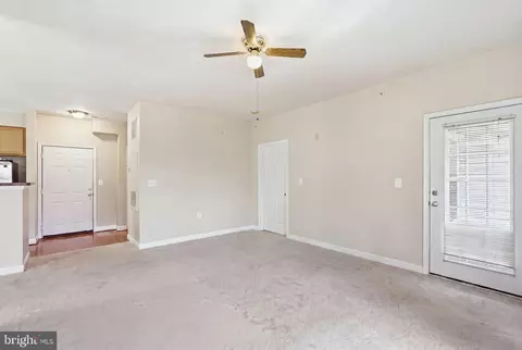 Living - 22668 Blue Elder Ter #304, Brambleton, VA 20148 photo 1 of 6