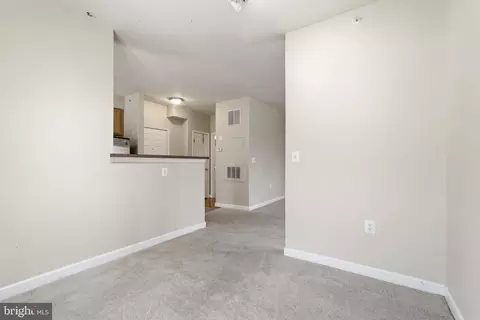 Living - 22668 Blue Elder Ter #304, Brambleton, VA 20148 photo 5 of 6