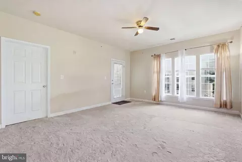 Living - 22668 Blue Elder Ter #304, Brambleton, VA 20148 photo 2 of 6