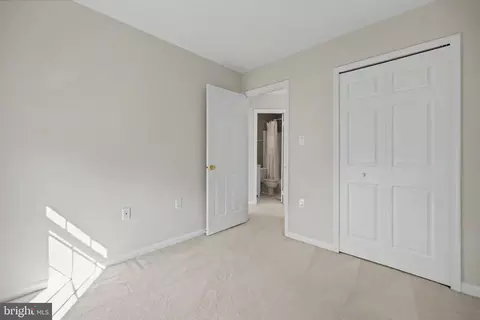 Bedroom - 21130 Winding Brook Sq, Ashburn, VA 20147 photo 7 of 8