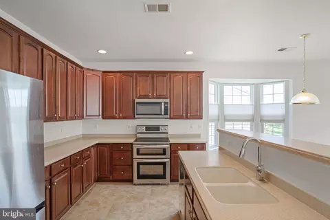 Kitchen - 16149 Dancing Leaf Pl, Dumfries, VA 22025 photo 2 of 3