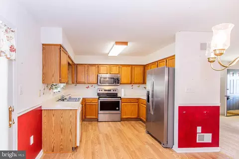 Kitchen - 124 Orchid Ln, Falling Waters, WV 25419 photo 1 of 2