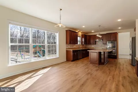 Kitchen - 83 Tributary Trl, Falling Waters, WV 25419 photo 7 of 9