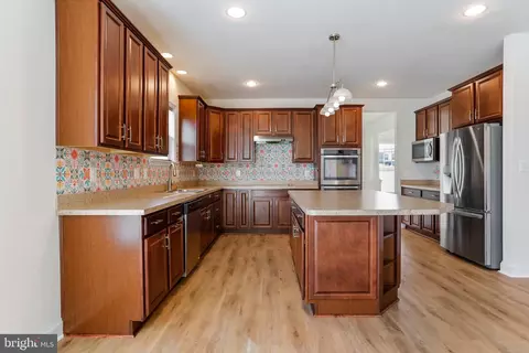 Kitchen - 83 Tributary Trl, Falling Waters, WV 25419 photo 3 of 9