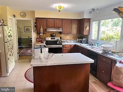 Kitchen - 51 Moore Ln, Falling Waters, WV 25419 photo 2 of 3