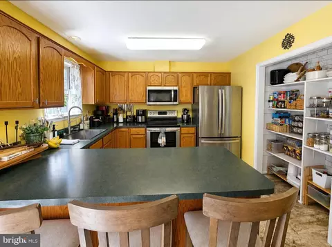 Kitchen - 61 Clemson Dr, Falling Waters, WV 25419 photo 2 of 3