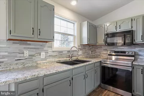 Kitchen - 211 E 11th Ave, Ranson, WV 25438 photo 3 of 4