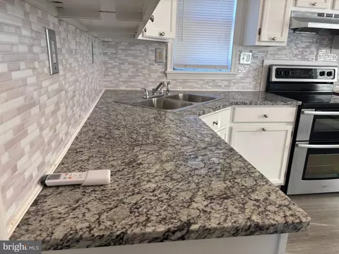 Kitchen - 119 W 7th Ave W, Ranson, WV 25438 photo 3 of 3