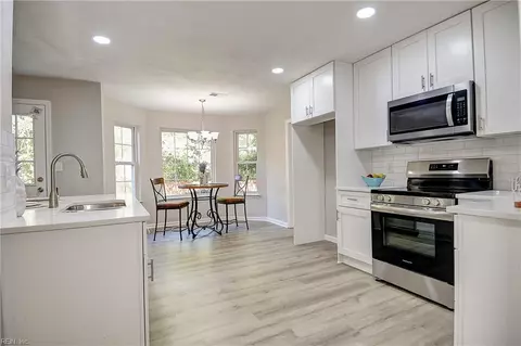 Kitchen - 6832 Ivanhoe Ct, Suffolk, VA 23435 photo 2 of 7
