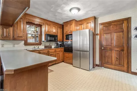 Kitchen - 2468 Freeman Mill Rd, Suffolk, VA 23438 photo 2 of 2