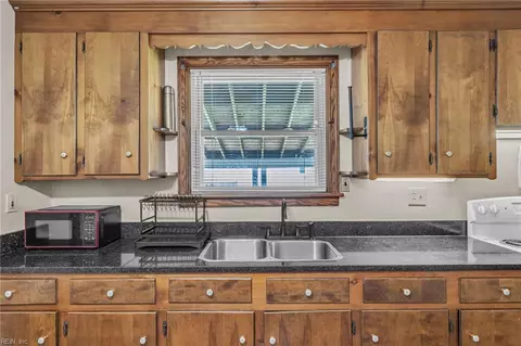 Kitchen - 2446 Woolsey St, Norfolk, VA 23513 photo 3 of 4
