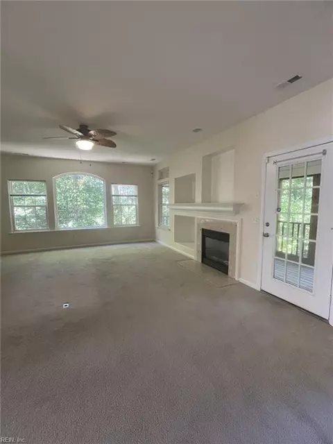 Living - 2064 Nicklaus Dr, Suffolk, VA 23435 photo 5 of 9
