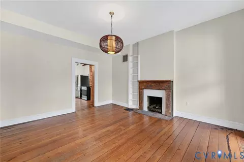 Living - 2513 E Grace St, Richmond, VA 23223 photo 3 of 5