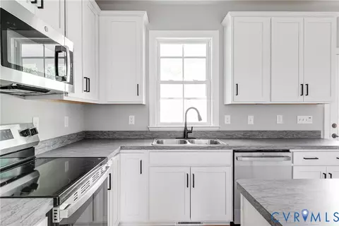 Kitchen - 312 E 33rd St, Richmond, VA 23224 photo 3 of 4
