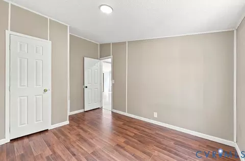 Bedroom - 977 Burchs Mill Rd, Urbanna, VA 23175 photo 2 of 5