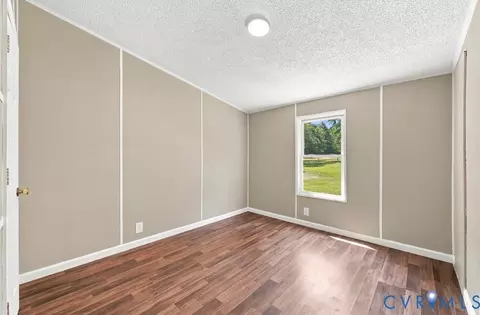 Bedroom - 977 Burchs Mill Rd, Urbanna, VA 23175 photo 3 of 5