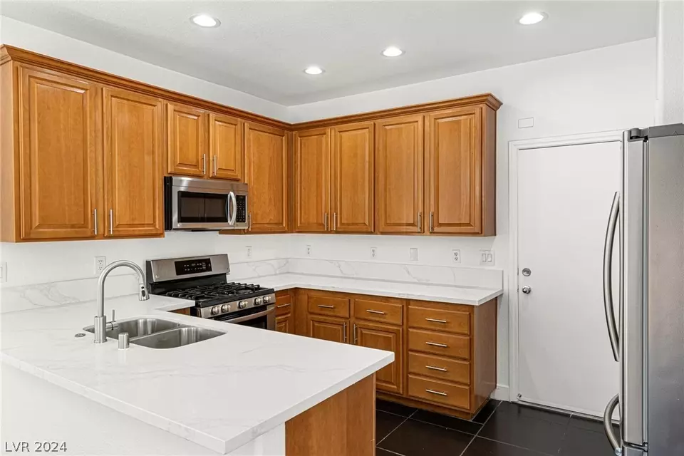 Kitchen - 9321 Colorful Rainbow Ave, Las Vegas, NV 89166 photo 7 of 7