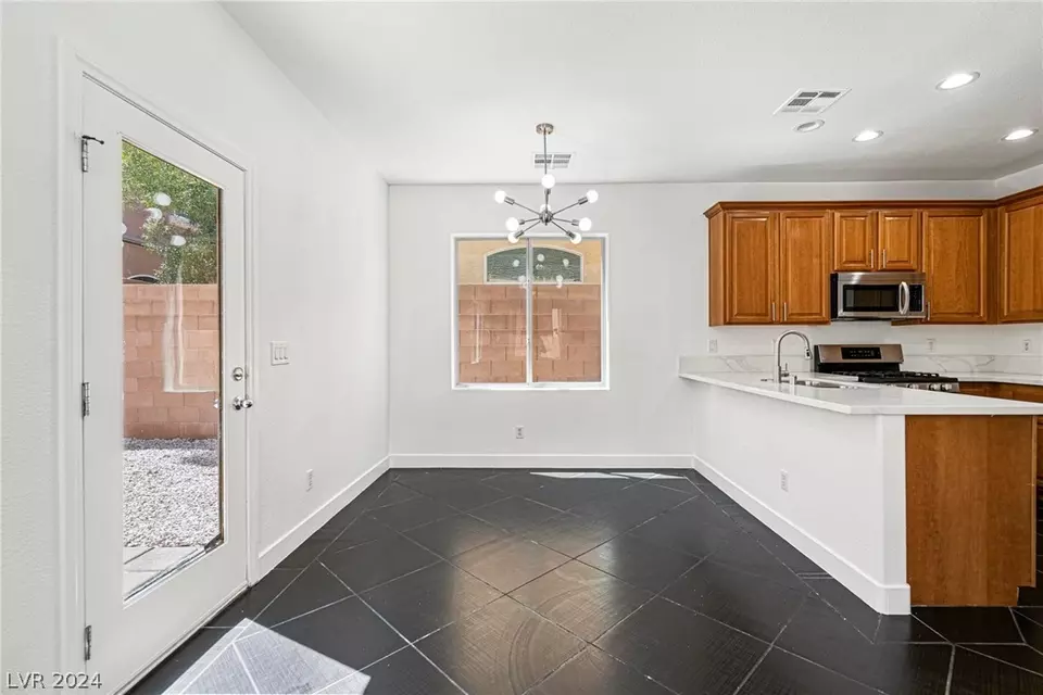 Kitchen - 9321 Colorful Rainbow Ave, Las Vegas, NV 89166 photo 5 of 7