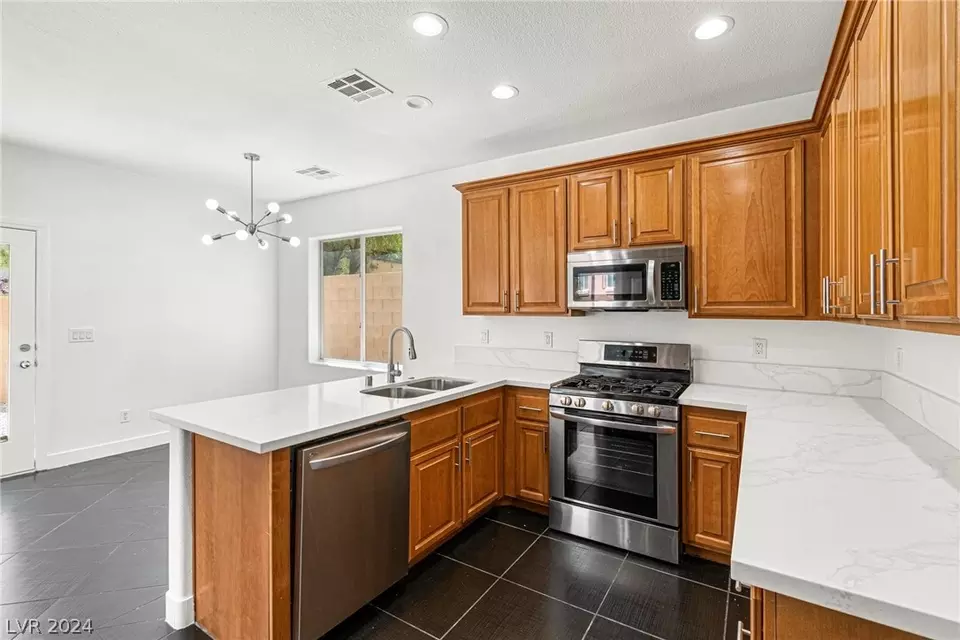 Kitchen - 9321 Colorful Rainbow Ave, Las Vegas, NV 89166 photo 1 of 7