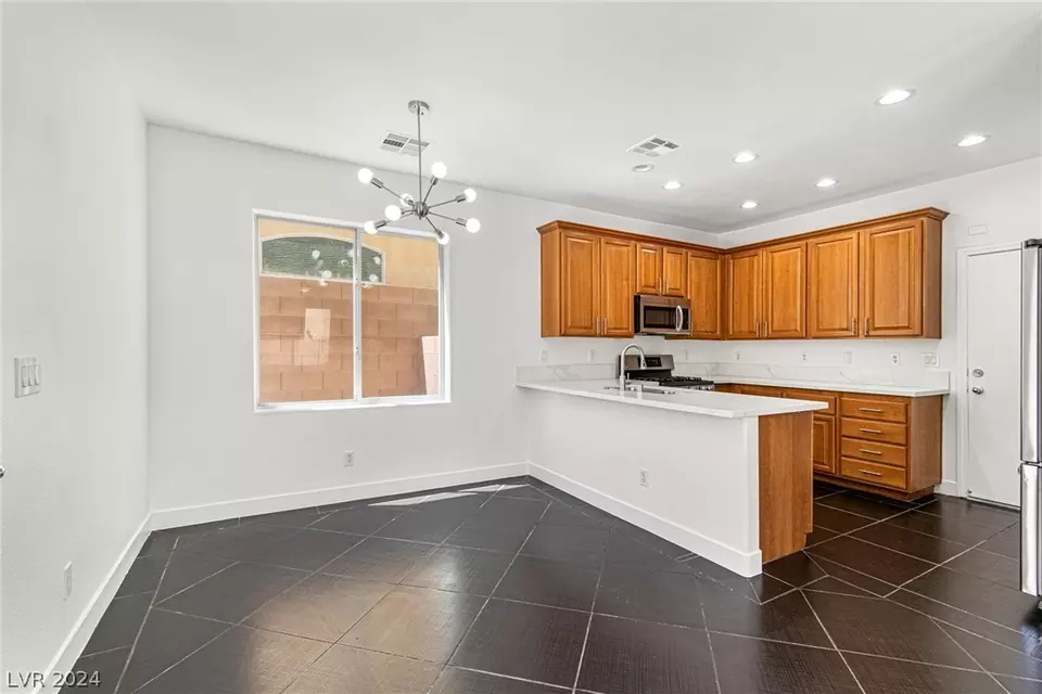 Kitchen - 9321 Colorful Rainbow Ave, Las Vegas, NV 89166 photo 4 of 7