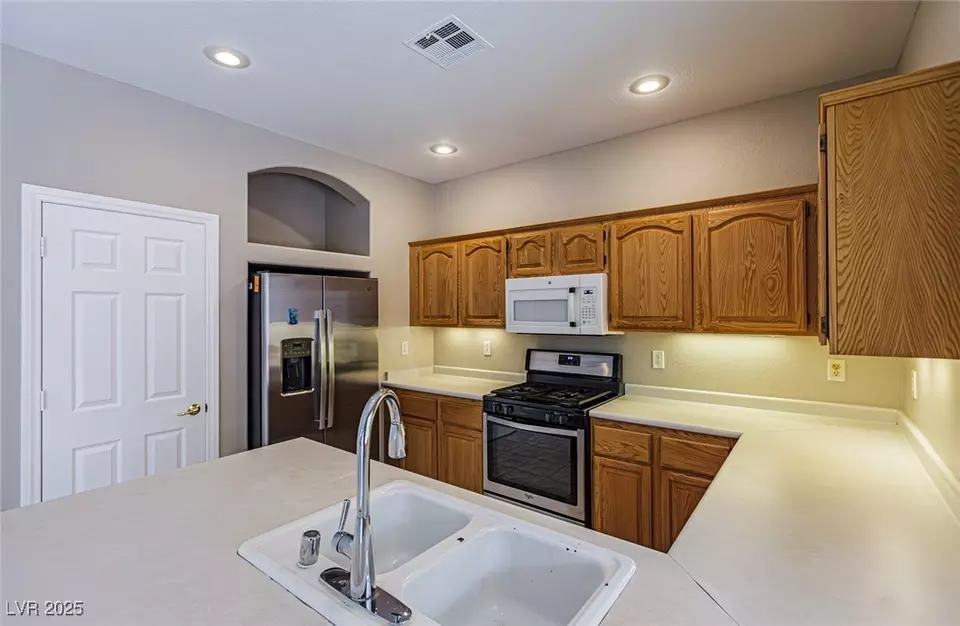 Kitchen - 8290 Golden Cypress Ave, Las Vegas, NV 89117 photo 3 of 5
