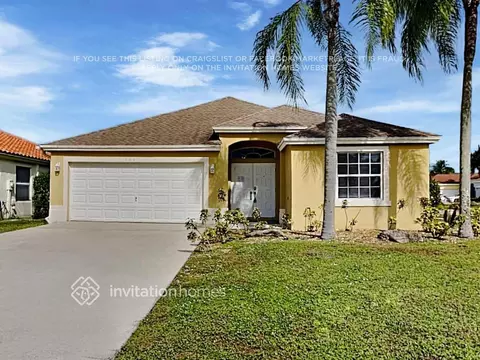 100 Derby Ln, Royal Palm Beach, FL 33411