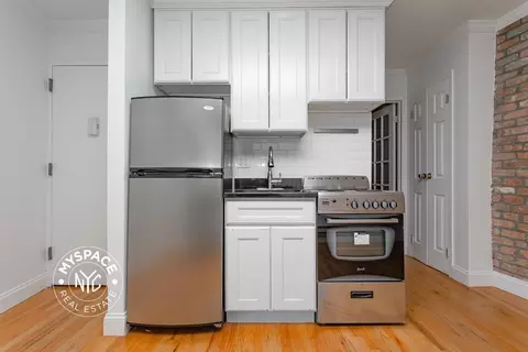 103 E 2nd St #1, New York, NY 10009