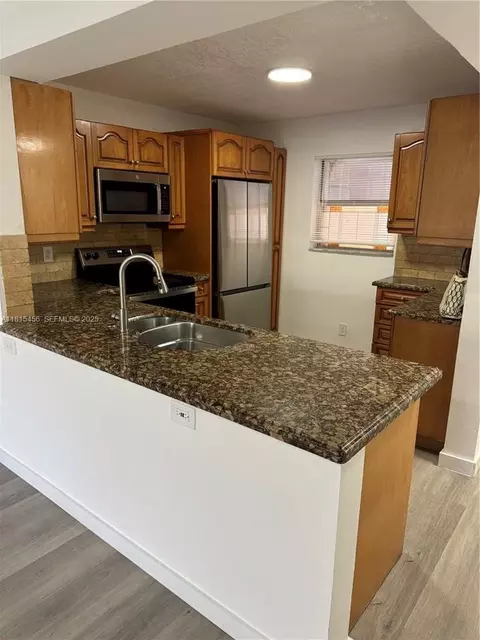2820 Riverside Dr # 107, Coral Springs, FL 33065