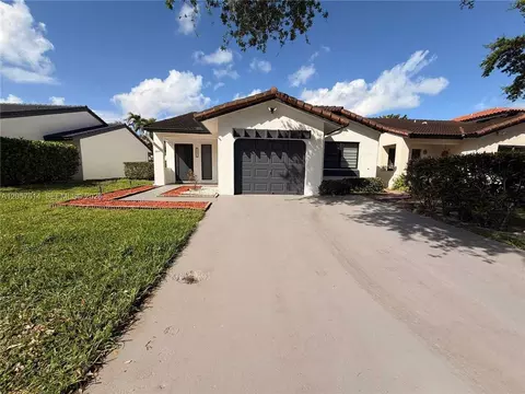 6641 NW 174th Ter #6641, Country Club, FL 33015