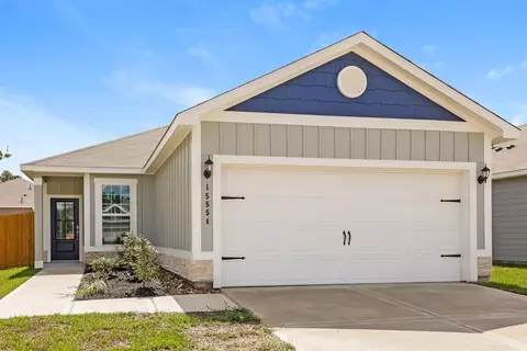 15554 Caramel Springs Dr, Conroe, TX 77303