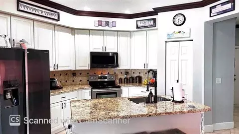 7576 Savannah Ln, Greenacres, FL 33463