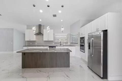 104 Oxford Ct, Royal Palm Beach, FL 33411
