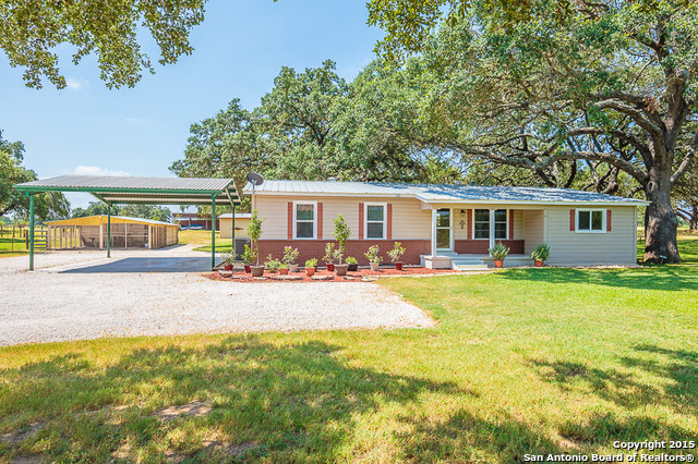 891 County Road 665, Devine, TX 78016 photo 1