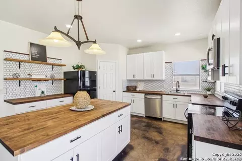 Kitchen - 1783 County Road 7711, Devine, TX 78016 photo 3 of 5