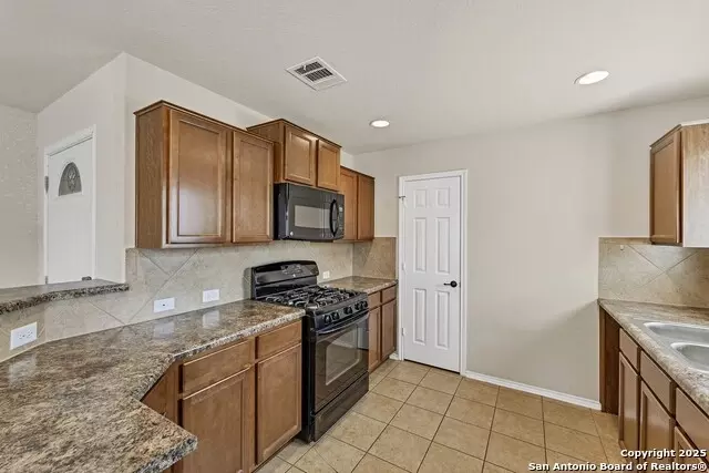 Kitchen - 11219 Five Iron, San Antonio, TX 78221 photo 1 of 7