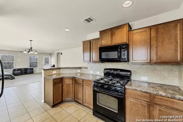 Kitchen - 11219 Five Iron, San Antonio, TX 78221 photo 4 of 7