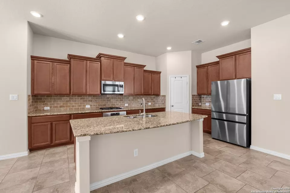 Kitchen - 944 Raceland Rd, San Antonio, TX 78245 photo 3 of 3