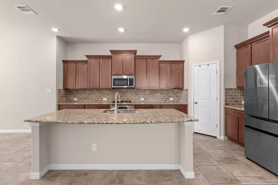 Kitchen - 944 Raceland Rd, San Antonio, TX 78245 photo 2 of 3