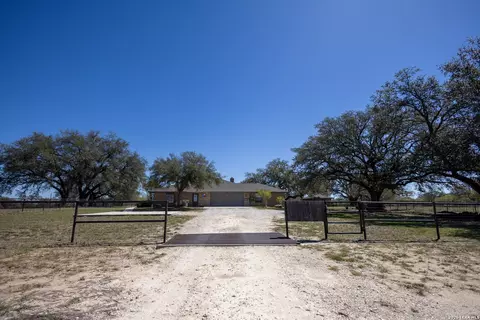 Exterior - 1219 County Road 761, Devine, TX 78016 photo 7 of 11