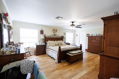 Bedroom - 1219 County Road 761, Devine, TX 78016 photo 1 of 9