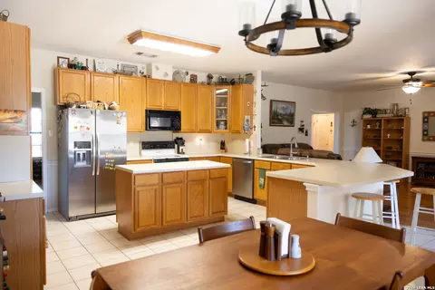 Kitchen - 1219 County Road 761, Devine, TX 78016 photo 1 of 2