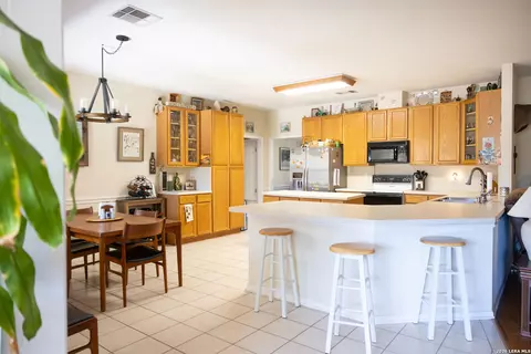 Kitchen - 1219 County Road 761, Devine, TX 78016 photo 2 of 2