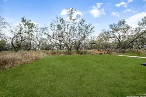 Exterior - 558 County Road 7713, Devine, TX 78016 photo 3 of 6