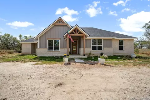 Exterior - 558 County Road 7713, Devine, TX 78016 photo 5 of 6