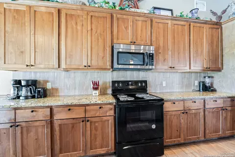 Kitchen - 72 Mountain Laurel, Concan, TX 78838 photo 2 of 3