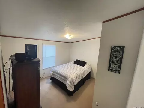 Bedroom - 1420 E Klr 2, Junction, TX 76849 photo 2 of 3