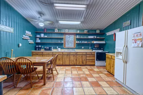 Kitchen - 711 Mariposa Ave, Concan, TX 78838 photo 1 of 2
